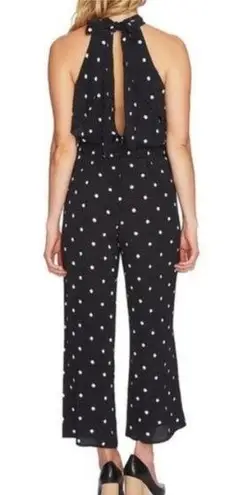 1. State   BLACK WHITE POLKADOT JUMPSUIT OPEN BACK COLD SHOULDER HIGH NECK XS