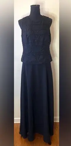 Karen Miller - Black maxi dress‎ with detailing on the top
Size 10