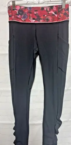LULULEMON black ruched ruffle leggings size 4 Side pockets red band