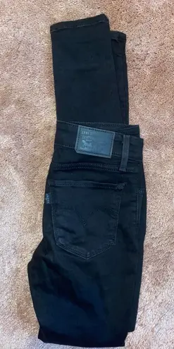 Levi’s 711 Black Ripped Skinny Jeans Size 25