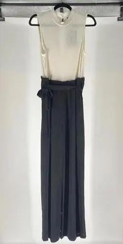 Chic Black and Ivory Jumpsuit with Bow Detail