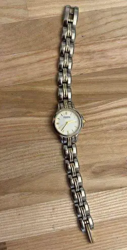 Caravelle by Bulova Ladies Watch Gold Silver Tone Bracelet White Dial Gold Hands