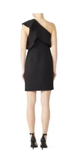 Slate + Willow Sleek one shoulder little black dress Ruffles on the right shoulder .