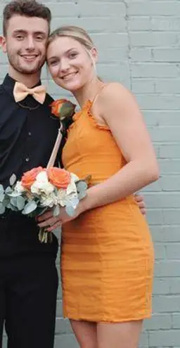 Selfie Leslie orange homecoming dress