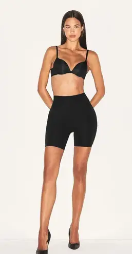 SKIMS Body Hip Enhancing Padded Short in Onyx, Size X-Small