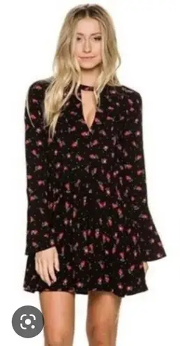 Free People Tegan mini dress black and red floral long sleeve with front and back cut out 