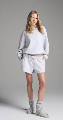 SKIMS Cotton Fleece Classic Crewneck in Light Heather Grey, Size XXS