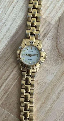 Caravelle by Bulova Ladies Watch Gold Tone Bracelet Pearl Dial Luminous Markers