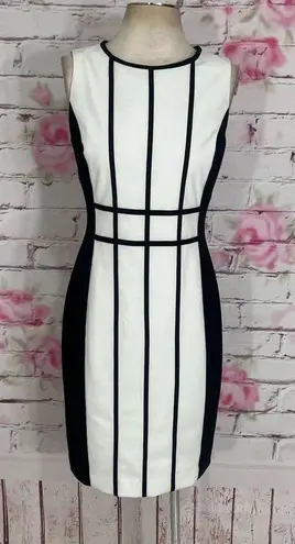 Calvin Klein  nwot sleeveless white sheath dress with black trim and piping