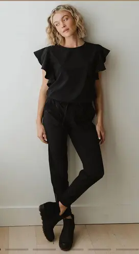 Albion Fit Nine To Nine Ruffle Sleeve Jumpsuit black size medium