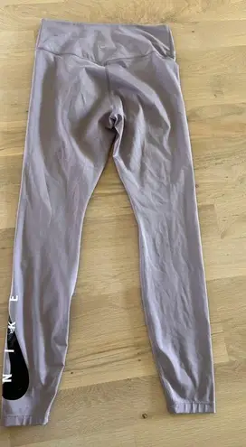 Nike  swoosh 7/8 leggings in purple size medium