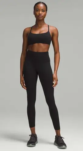 Lululemon  Wunder Train High-Rise Ribbed Tight Legging 25" in Black Size 4 thumbnail 3