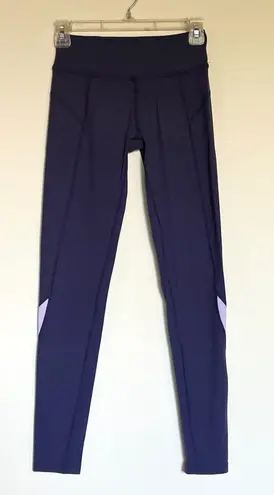 Beyond Yoga Elevate front seam long leggings in navy and lilac size S small