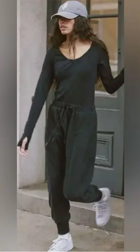 NWOT FP Movement by Free People Make It Count Onesie Black