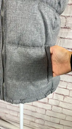 Old Navy Herringbone Heather Gray Fleece Lined Puffer Vest. Like new. Fleece lined pockets. Collar can be worn up or down. Very warm.  24.5” long 17.5” bust approximately