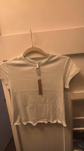 SKIMS Ivory DROP NEEDLE POINTELLE BABY TEE