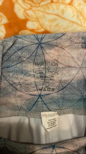 Evolution and creation  Cropped Leggings