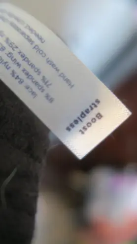 Cacique Lane Bryant boost strapless bra jewelry on front lacey in black size 44DD.