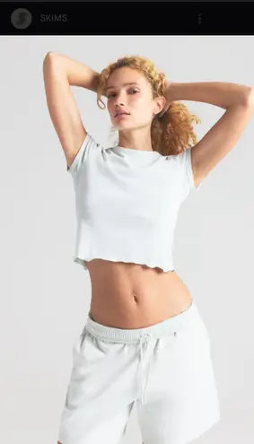 SKIMS Ivory DROP NEEDLE POINTELLE BABY TEE