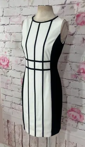 Calvin Klein  nwot sleeveless white sheath dress with black trim and piping