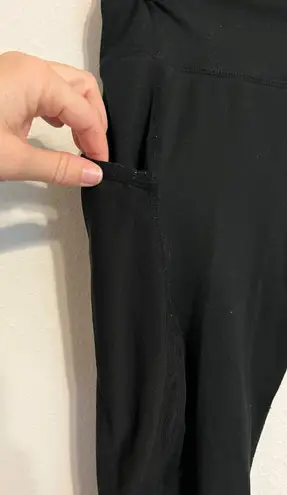 Gymshark black leggings with mesh down sides and pockets