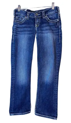 Silver Women's Santorini Capri Distressed Jeans in Medium Wash. Size 26 Blue