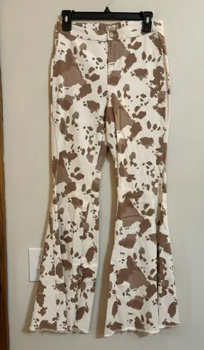 Altar'd State Flare Cowprint Jeans