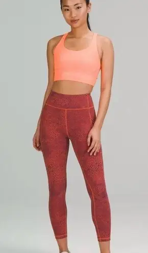Lululemon Invigorate HR Tight 25” in Orange Pattern