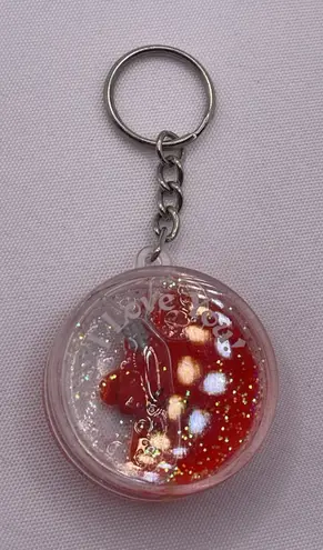 Handmade Resin Made Gold Heart Pendant With Color Accents Shiny Beautiful Keychain - Image 1