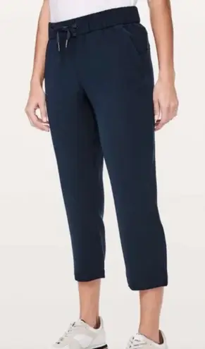 Lululemon  On The Fly Crop *Woven 23" Blue True Navy Womens‎ Size 12 LW6AVMS - Image 1