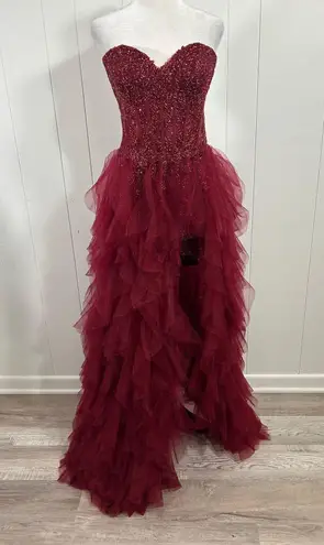 Prom Bay size 6 prom dress in the color wine. Corset with Lace up back & Ruffles Red
