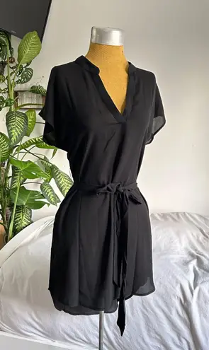 Black blouse like short sleeve high low belted dress