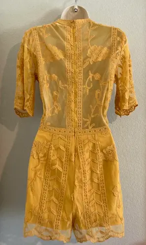 Socialite Like new  plunging neck romper.