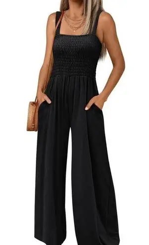 Automet size medium black wide leg cropped tank top romper with rushing on top.