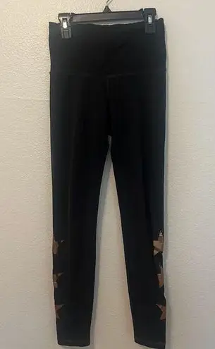 Strut this  Women’s Black Gold Stars Leggings One Size Gym Workout