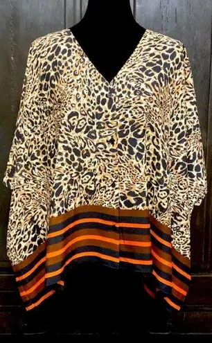Melissa Page animal pattern poncho. One size