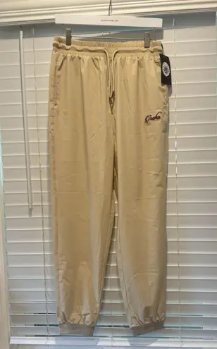 Inaka Women's Performance Nylon Spandex Sweats Baggy Joggers NWT Size L Ivory Tan Size L