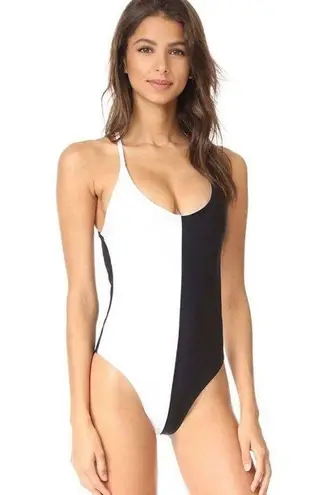 PilyQ New.  Black and white one piece.￼