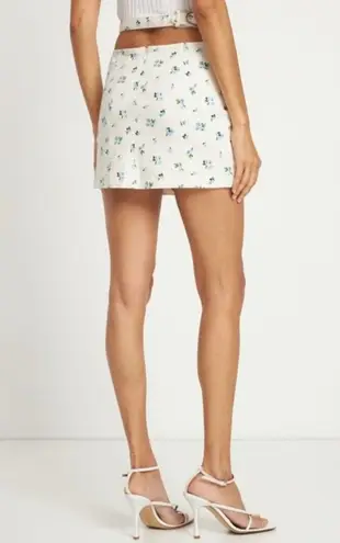We Wore What cut out mini skirt watercolor ditsy zr5 ivory with blue floral medium