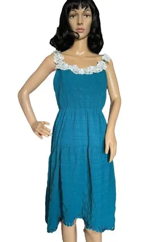 Daisy tiered smocked open back with bow high low dress size medium Blue - Image 1
