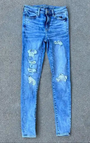 American Eagle AEO Super Hi Rise Jegging Size 2 Long Next Level Stretch distressed frayed jeans