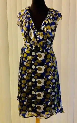 Sleeveless wrap around dress. Blue