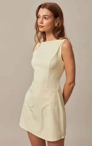 Rihoas Yellow Boat Neck Cutout Mini Dress