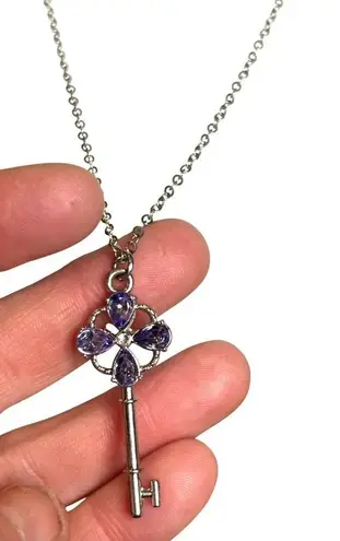 Silver Key Pendant Necklace With Purple Gemstone Accents & Chain