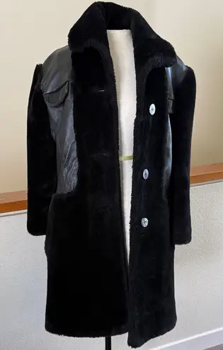 One of a kind Black genuine leather and Faux Fur Coat Size M