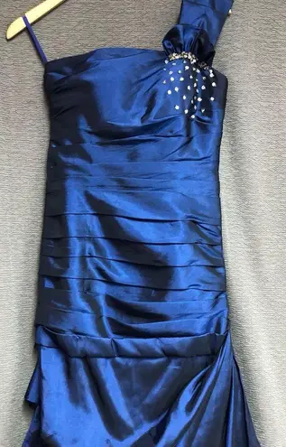Sapphire blue, one shoulder with a bow on that shoulder, ruching down front