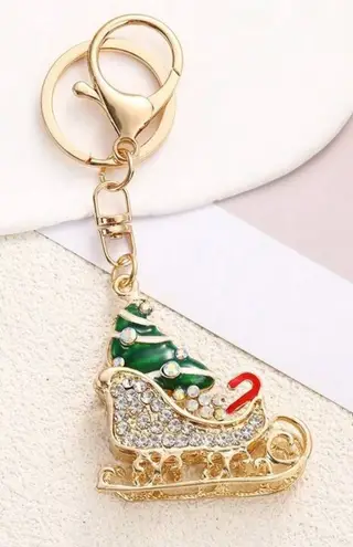 Rhinestone Christmas sleigh with presents bag charm/key ring Gold