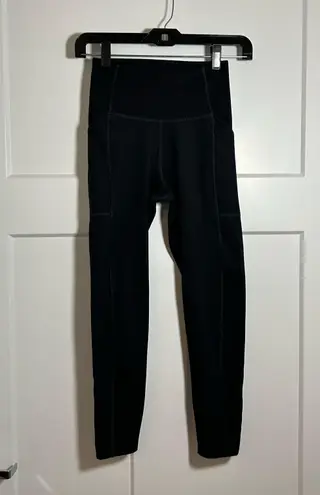 Girlfriend Collective XS leggings with pockets - black, 7/8 ankle.