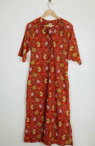 dRA Anthropologie orange and floral block print caftan midi dress. Size Small