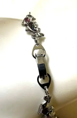 Silver tone dolphin pink abalone bracelet